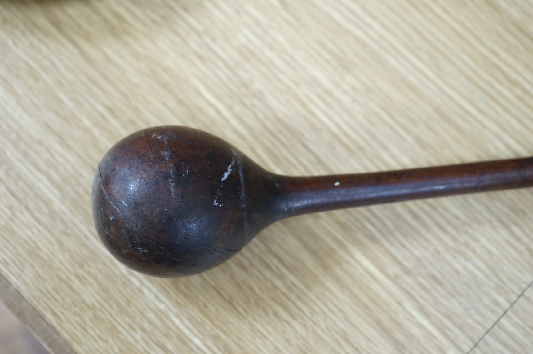 A Zulu Knobkerrie, late 19th century, Provenance - vendors grand father in law brought back from Africa when working in the Gold Coast late 19th/early 20th century. 51cm long.